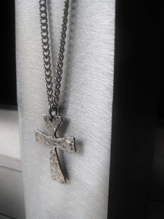 Sterling Silver Cross Pendant Necklace Silver Cross Jewelry Religious Pendant Gift for Him Gift for Her PENDANT Rustic, solid sterling silver cross measures .5 inches x .75 inches. It is hammered and shown lightly oxidized. CHAIN Necklace is a solid stainless steel curb chain that is 3mm wide and has a lobster claw/ring closure. SIZE In personalization at checkout please add your preferred end to end chain length(includes clasp)from 12-24 inches. Shown worn long on model is 24 inches. Spiritual Hammered Cross Necklace, Handmade Stainless Steel Cross Jewelry, Hand Forged Crucifix Jewelry Gift, Silver Symbolic Cross Necklace As Gift, Hand Forged Cross Jewelry For Gifts, Hammered Cross Pendant Jewelry As A Gift, Hand Forged Silver Cross Necklace, Hammered Cross Pendant Necklace For Gift, Hammered Cross Necklace For Gift