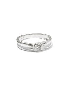 a white gold ring with two diamonds on it