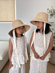 Get ready, the Ella Summer Girl Hat has arrived. Featuring with cotton neck tie and adjustable string inside the hat, this is the ultimate seaside accessory for your mini. Size: One Size 53cm Suitable for children aged 3+ years. Color: Off White Imported Cute Summer Sun Hat For Playtime, Cute Summer Sun Hat For Play, Cute Bucket Hat For Beach Season, Spring Adjustable Hats For Play, Playful Adjustable Hat For Vacation, Adjustable Sun Hat With Upf 50+ For Play, Pre-tied Cotton Hat For Beach, Playful Brimmed Straw Hat For Summer, One Size Fits Most Summer Play Hat