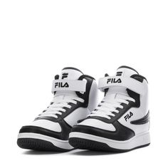 Upgrade your look with a standout classic sneaker. The FILA A High shoes feature a pebbled leatherette upper with stitched overlays to create a streamlined look. Perforations on the toecap add airflow where you need it most, and the textile lining is soft and comfortable. An adjustable closure strap at the front allows for a custom fit. Lace-up high-top with an adjustable closure strap. Durable synthetic leather upper. Perforated toe cap adds breathability. Embroidered logo detailing throughout. Fila High Top Shoes, Classic High-top Sneakers With Abzorb Midsole For Sports, Classic High-top Sneakers For Casual Wear, Classic Basketball Shoes With Round Toe And Perforations, Streetwear Low-top Basketball Shoes With Rubber Heel Cap, Sporty Basketball Shoes With Rubber Heel Cap, White Synthetic High-top Sneakers With Rubber Sole, Modern Basketball Shoes With Perforations And Round Toe, Low-top Synthetic Basketball Shoes With Perforations