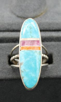 Kingman Turquoise,  Spiny Oyster and Sterling Silver Ring Size 6 features the range of colors spiny oyster has and stone setting measures 1 3/8" long and 3/8" wide Collectible Blue Multi-stone Turquoise Ring, Collectible Multi-stone Blue Turquoise Ring, Southwestern Multicolor Gemstone Turquoise Ring, Southwestern Multicolor Turquoise Gemstone Ring, Unique Blue Turquoise Multi-stone Ring, Oval Multicolor Turquoise Ring With Natural Stones, Southwestern Multi-stone Turquoise Ring, Spiny Oyster, Stone Setting