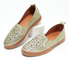 These leather slip-ons boast an intricately designed, perforated upper that demands attention. Whether you choose to wear them with your go-to jeans, a cute maxi dress, or shorts during those warm summer months, they're destined to radiate your sense of style for all to enjoy. From Spring Step. Leather Slip-ons With Woven Sole For Spring, Comfortable Leather Slip-ons For Spring, Spring Flat Heel Slip-ons With Perforations, Spring Slip-ons With Perforations And Flat Heel, Spring Perforated Flat Heel Slip-ons, Summer Leather Slip-ons With Perforations, Summer Leather Slip-ons, Leather Slip-ons With Perforations For Summer, Summer Slip-ons With Stitched Sole And Flat Heel