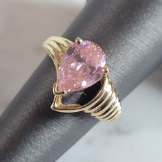 A Womens Vintage Estate 10k Yellow Gold Rose Quartz Ring. The Ring Weighs 3.6g And Is A Size 6.0. Not Sure If The Rose Quartz Is Real Or Man Made. The Width Of The Ring Is 1/2". Any Questions, Please Do Not Hesitate To Ask. Be Sure To Check Out Some Of Our Other Items For Sale. Elegant Pink Diamond Ring In 14k Gold, Pink Teardrop Fine Jewelry Ring, Pink Morganite Rings For Anniversary, Pink Morganite Pear-shaped Jewelry, Pink Fine Jewelry Rings For Formal Occasions, Pink Pear-shaped Morganite Jewelry, Formal Pink Morganite Rings, Pink Pear-shaped Diamond Ring, Elegant Pink Teardrop Ring