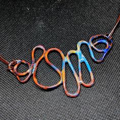 Multi Colored Vitreous Enamel Artisan Necklace | Etsy Artistic Multicolor Copper Jewelry, Artsy Hand Painted Copper Jewelry, Multicolor Copper Necklace, Unique Multicolor Copper Necklace, Unique Enamel Necklace With Artistic Design, Spiral Multicolor Necklace Gift, Multicolor Spiral Necklace Gift, Artistic Handmade Swirl Jewelry, Unique Blue Copper Wire Necklaces