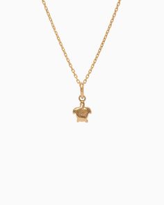 The Turtle Charm is handcrafted in 14K solid gold and features a detailed design inspired by sea turtles, celebrated as iconic symbols of the Caribbean. Playful yet sophisticated, this charm complements any look. Pair with your favorite hook bracelet or dainty chain, sold separately. Metal: 14K solid gold Dimensions: 9.5mm x 6mm x 2mm Style #: GC203S Gold-plated Jewelry With Logo Charm, Luxury Yellow Gold Pendant Charms, Luxury Charm Necklaces With Logo, Classic Gold Plated Jewelry With Logo Charm, Classic Gold-plated Jewelry With Logo Charm, Elegant Gold Charm Necklace With Starfish, 14k Gold Starfish Charm Jewelry For Gifts, Gold Sterling Silver Jewelry With Starfish Charm, 14k Gold Jewelry With Starfish Charm For Gift