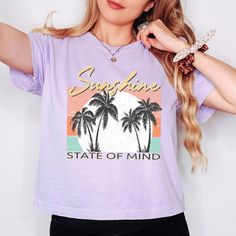 Looking for a cute versatile top to wear? Make sure to grab one of our Graphic Tees! This soft and comfortable graphic Tee is the perfect top for any outfit. It can be paired with biker shorts, jeans, or even a simple skirt/dress! This Tee is true-to-size, so be sure to order your regular t-shirt size! If you are looking for a more oversized look, make sure to size up! Sunshine State Of Mind, Ribbed Halter Top, Tiny Tank, Simple Skirt, Sunshine State, Cropped Tee, Slim Fit Shorts, Crop Tshirt, Oversized Look