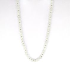 This 18.5" necklace features hand-knotted white Jade gemstones strung with lime green silk thread. Finished with a gold-filled clasp, it offers the versatility of adding charms for a personalized touch and looks great layered or worn alone. White Jade is believed to promote love, luck, and peace. White Jade Beaded Necklace With Gemstone Beads, White Beaded Jade Jewelry, White Jade Necklace With Natural Stones, White Single Strand Jade Jewelry, White Adjustable Jade Necklace, Lime Green Necklace, Pearl Charm Necklace, Jade Necklace, White Jade