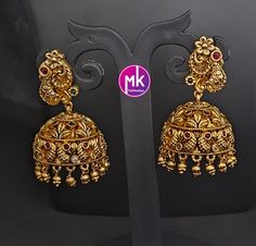 Peacock Premium Quality Gold finish AD stone Jhumka with Hanging gold balls - MK Fashionkart - Fashion Jewelry Material: Gold finish with AD stones MK Fashionkart Indian Fashion Jewelry Suitable for Saree/Salwar/party wear dresses   SHIPPING : Ready to ship in 1 business day. This item will be shipped from The United States. Jewelry care instructions : 1. Please wipe the jewelry with a piece of cotton cloth after usage.  2. Store the jewelry in a cool, dry and air tight box or pouch.  3. Make sure the jewelry is away from direct heat and water. 4. Please wipe of any moisture, sweat, soap water after usage. Salwar Party Wear, Indian Fashion Jewellery, Jewelry Care Instructions, Party Wear Dresses, Jewelry Care, Gold Finish, Indian Fashion, Favorite Jewelry, Party Wear