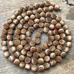 📿 This pure natural Tulsi Prayer Beads mala is made of 108 + 1 beads. Each bead is engraved with Lord Rama ' राम ' name in Hindi on it. Tulsi Mala maintains ritual purity and wards off evil. Tulsi Mala is also used for the purification of the body. Tulsi is considered to be an adaptogen, balancing different processes in the body, and helpful for adapting to stress.📿 🚪 Dimensions ( Approximately ) 🚪 📏Mala Beads size: 10 mm 📏No. of beads: 108+1 📏Mala Necklace Length: 46-47 inches 🤚 HANDCRA Hand-strung Natural Beaded Necklace For Gift, Natural Hand-strung Beaded Necklace As A Gift, Hand-strung Natural Beaded Necklaces As Gifts, Hand-strung Natural Beaded Necklaces For Gifts, Natural Beaded Necklace As Gift, Spiritual Necklace With 108 Natural Beads, Hand-strung Necklaces With Round Natural Beads, Natural Hand-strung Necklaces With Round Beads, Natural Color Hand-strung Necklaces With Round Beads