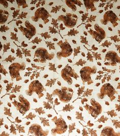 a brown and white floral pattern on fabric