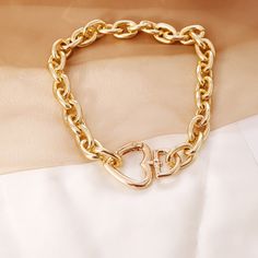 FREE SHIPPING ON ALL ORDERS OVER $50 | 100% SATISFACTION GUARANTEED Click "ADD TO CART" To Get Yours Now | Up To 60% OFF ✨ Express your affection. This lovely Geometric Alloy Thick Necklace Bracelet Set makes a good gift for every day, you can wear it whenever you want to. This set from Arimonz is made of alloy material. It is fashionable and attractive, looks chic and gorgeous, will be your all-match accessory in day-to-day life. Features: 📌 Soft and elegant with vintage style📌 Made With Meta Trendy Gold Heart Bracelet With Chain, Gold Heart-shaped Chain Bracelets, Valentine's Day Gold Chunky Chain Jewelry, Trendy Gold Heart Charm Bracelet, Trendy Gold Heart Bracelet With Adjustable Chain, Gold Metal Bracelets For Valentine's Day, Gold Heart-shaped Charm Bracelet With Adjustable Chain, Gold Heart Bracelet With Lobster Clasp, Gold Charm Bracelet With Adjustable Chain For Valentine's Day