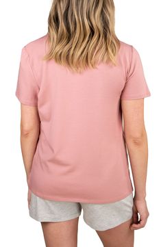 Made with a tulip-hem overlay for quick nursing access, this relaxed T-shirt is sure to be a mainstay for on-the-go parents. Surplice crewneck   Short sleeves   47% Tencel® modal, 47% cotton, 6% elastane   Tencel modal is a sustainably produced fiber made with closed-loop processing and is certified with the EU Ecolabel as having a low environmental impact throughout the entire lifecycle   Machine wash, tumble dry   Made in Turkey   OEKO-TEX®–certified materials free of harmful substances Casual Nursing Friendly Short Sleeve T-shirt, Casual Cotton Nursing-friendly Tops, Comfortable Pink Crew Neck Top, Pink Cotton Top With Shirttail Hem, Casual Crew Neck Nursing Friendly T-shirt, Casual Pink Tops With Shirttail Hem, Spring Solid Color Nursing Tops, Comfortable Pink Tops For Spring, Comfortable Pink Short Sleeve Top