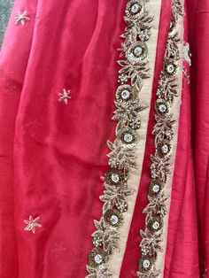 This gorgeous red raw silk bridal lehenga with zardosi and sequins work butti is teamed with a red heavy cutwork blouse. This outfit is completed with a red organza embroidered dupatta.
*Ready to ship in sizes XS, S, M, L Designer Red Chanderi Traditional Wear, Traditional Drape Raw Silk Sharara With Dori Work, Red Raw Silk Anarkali Set With Dupatta, Red Bollywood Anarkali Set With Traditional Drape, Red Anarkali Sharara With Zari Work, Red Sharara With Zari Work, Festive Red Set With Gota Work, Red Raw Silk Anarkali Set For Navratri, Red Anarkali Sharara For Reception