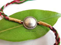 "The Rakhi festival is a bond of love between brother and sister. This Rakhi(rakshaban) festival is \"one of the greatest event happens in the world\" This is not only a \"thread\". This thread of cotton is the witness of love between sister and brother. This raksha sutra( thread of love ) is made by the indian artisan for this upcoming great occasion of Rakhi. This is also called as the 'Indian thread bracelet' and made by 'sterling silver 925' Specifications Material - Sterling silver (92%silv Festive Traditional Wear With Cutdana, Traditional Wear As Diwali Gift, Traditional Handloom Wear As A Gift, Traditional Wear With Tilla As Gift, Multicolor Traditional Wear For Navratri Gift, Silver Traditional Wear For Celebration, Traditional Wear With Latkans As Gift, Traditional Wear With Latkans, Bohemian Traditional Wear With Latkans For Festivals