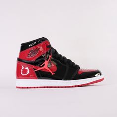 Debuted in 1985, the Air Jordan 1 Patent Bred offers a rendition to the iconic classic. Released December 30th, 2021. * Encapsulated Air Sole * Genuine patent leather in the upper offers durability * Air Jordan ball and wings logo on side * Black toe colour blocking Size and Fit* Fits true to size Leather Sneakers With Red Sole For Streetwear, Leather Jordan Lace-up Shoes For Streetwear, Leather Jordan Shoes For Streetwear, Low-top Patent Leather Sneakers For Streetwear, Leather Custom Sneakers For Streetwear, Leather High-top Sneakers With Red Sole For Streetwear, Leather Lace-up Jordan Shoes For Streetwear, Leather Jordan Shoes With Boost Midsole For Streetwear, Custom Low-top Patent Leather Sneakers For Streetwear