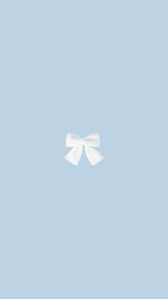 a white bow on a light blue background