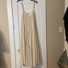 Brand New Without Tags, Size Medium. Excellent Condition. The Straps Tie And Are Fully Adjustable. Cream Sundress Maxi Dress For Day Out, Flowy Cream Maxi Dress For Vacation, Cream Cotton Maxi Dress For Vacation, Cream Maxi Sundress For Vacation, Cream Summer Maxi Dress, Cream Flowy Sundress Maxi Dress, Summer Cream Maxi Dress, Cream Maxi Length Sundress For Vacation, Cream Cotton Sundress Maxi Dress