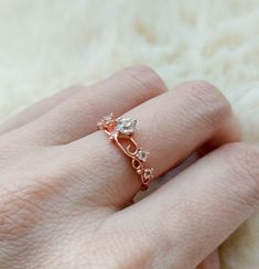 A romantic and feminine princess ring with delicate details, perfect gift for your little princess! Stone: Nature white Topaz in 4mm & 2.2mm. Bandwidth: 1.1mm Metal: 14k rose gold plated sterling silver base Delicate Crystal Ring For Anniversary, Delicate Anniversary Crystal Ring, Dainty Rose Gold Jewelry For Proposal, Delicate Rose Gold Promise Rings, Delicate Rose Gold Crystal Wedding Ring, Cubic Zirconia Rose Gold Birthstone Ring For Promise, Delicate Rose Gold Crystal Ring For Wedding, Delicate Rose Gold Flower Ring For Promise, Delicate Rose Gold Jewelry For Proposal