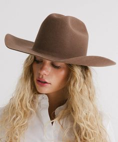 From coffee dates to country music festivals, the Teddy Cattleman Hat has you covered. With a true cattleman crown + wide western brim, this classic cowgirl hat is sure to stand out in a crowd. May we suggest taking Teddy up a notch? Shop Western bands + your favorite hat trims to make the look your own! Bands pictured are sold separately HERE! Western Curved Brim Hat For Rodeo, Western Riding Hats For Winter, Southern Style Fedora For Western-themed Events, Western Short Brim Hats For Country Concerts, Western Style Wide Brim Felt Hat For Kentucky Derby, Western Riding Hat With Curved Brim, Western Wide Brim Felt Hat For Kentucky Derby, Country Style Curved Brim Felt Hat For Riding, Country Style Felt Hat With Curved Brim For Rodeo