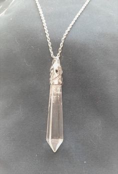 "Clear Quartz is known as the \"master healer\" and will amplify energy and thought, as well as the effect of other crystals.  It absorbs, stores, releases and regulates energy.  Clear Quartz draws off negative energy of all kinds.   Clear Quartz enhances psychic abilities.  It aids concentration and unlocks memory.  Stimulates the immune system and brings the body into balance.  Clear Quartz (Crystal Quartz, Rock Crystal) harmonizes all the chakras and aligns the subtle bodies. The Pendant come Spiritual Quartz Crystals For Healing, Healing Quartz Crystals For Spiritual Use, Silver Mystical Crystals For Meditation, Spiritual Clear Crystal Necklace For Healing, Quartz Crystal Pendant, Goddess Energy, Ritual Candles, Psychic Abilities, Clear Quartz Crystal