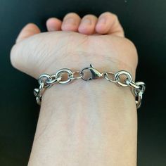 Our cable link bracelet comes in one universal size at 8" length, perfect for a loose fit. Made of 100% 316L Stainless Steel. Which will not rust, tarnish or turn green, and corrosion resistant. PRODUCT DESCRIPTION- 316L Stainless Steel, corrosion resistant, will not turn green- Strong and durable- Safe in water, shower safe. Sizing- 10mm wide- 8" Length SHIPPING- Free Shipping in the United States When You Order Now!- Worldwide shipping availableAll orders come with one quantity unless otherwis Metal Cuban Link Bracelet With Oval Links, Everyday Stainless Steel Tarnish Resistant Charm Bracelet, Hypoallergenic Stainless Steel Bracelets For Everyday, Stainless Steel Chain Link Bracelet For Everyday, Everyday Metal Chain Bracelet With Stainless Steel Clasp, Silver Tarnish Resistant Oval Link Bracelet, Classic Metal Bracelets With Cable Chain, Modern Metal Charm Bracelet With Extender, Tarnish Resistant Stainless Steel Chain Link Bracelets