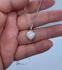 This beautiful heart charm necklace makes a perfect gift for that special person in your life and also a great gift for lovers of modern and minimalist jewelry. 💕 Approximately 1mm box chain (choice your length) Pendant  Height: 10.7mm Width: 11.8mm Thickness: 4.4mm Bail opening: 4mm Metal: 925 Sterling Silver ⭐️Free silver polishing cloth  ⭐️ It's completely natural for sterling silver to oxidize over time when it's exposed to air. Please, keep them in airtight plastic bag and use sterling silver polishing cloth to make them shine like new again. ⭐️ Each piece is packed in its own drawstring pouch and ordered is mailed out in bubble mailers to avoid any damages that can happen during transportation. White Gold Heart Pendant Necklace Gift, White Gold Heart Necklace Gift, White Gold Heart Necklace For Gift, Gift Heart Necklace With Adjustable Sterling Silver Chain, White Gold Heart Pendant Necklace As Gift For Her, Valentine's Day Diamond Cut Jewelry Gift, Valentine's Day Gift Diamond Cut Jewelry, Gift Sterling Silver Heart Necklace Diamond Cut, Sterling Silver Heart Necklace With Diamond Cut As Gift