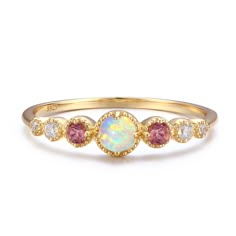 Crafted to give you that positive celestial vibe - the ring has the Opal daintily sited and beaming like a full moon, while gravitating towards the pink Tourmaline and white topaz to give you a supernatural sparkle. METALS 14k Yellow Gold Vermeil: The base metal is ethically-sourced nickel-free 925 Sterling Silver (perfect for sensitive skins). We add three layers of 14K gold/ rose gold or white gold, which gives your jewelry that extra, sparkly shine and adds durability to prevent oxidization. Birthstone Engagement Rings, Birthstone Rings, Gold Vermeil Jewelry, Zierlicher Ring, Vintage Style Rings, Stacked Jewelry, Tourmaline Ring, October Birthstone, Ring Ideas