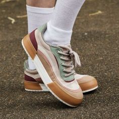 Retro vibes, meet modern comfort. ✨🌈 Channel your inner 70s cool kid with these playful platform sneakers. Groovy color block: Earthy tones of taupe, blush, and mint for a retro-inspired look. Comfy Inside: Plush foam insole for all-day cushioning (your feet will thank you!). Funky & fresh: 1.3-inch heel and .71-inch platform give you a little lift without sacrificing comfort. Soft & breathable: Combo of corduroy and fabric keeps your feet feeling good. Style chameleon: Pair these kicks with everything from denim to dresses. Style: Rocket Dog women's sneaker Upper: Corduroy and fabric upper Laces: Dusty rose Lining: Jersey Sole: White sole Trainer Type: Low top sneaker Toe Shape: Round Heel height: 1.3 inches Platform height: 0.71 inches Insole: Plush Foam Comfort Insole Knee High Boots Winter, Cool Kid, Rocket Dog, Sole Sneakers, Dresses Style, Corduroy Fabric, Good Style, New Sneakers, Taupe Color