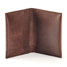 The Passport Wallet keeps your travel essentials organized and within reach while on the move. This portfolio-style wallet features two credit/business card pockets that hold three to four cards each plus two larger pockets to hold a passport, cash, tickets or other documents. Our Italian Horsehide products are made from full grain, vegetable tanned leather hides, imported and handcrafted at the Ezra Arthur workshop in Phoenix, Arizona. Made with 100% real leather and no linings, rubber or glue. Leather Hides, Passport Wallet, Leather Hide, Phoenix Arizona, Chicago Illinois, Vegetable Tanned Leather, Card Wallet, Travel Essentials, Real Leather