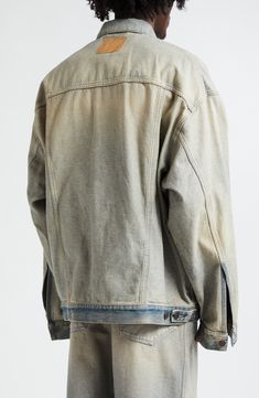 Balenciaga puts its signature avant-garde spin on the streetwear-staple trucker jacket in this oversized version cut from washed denim for an inside-out effect. 30 1/2" length (size 2) Front button closure Spread collar Button cuffs Chest button-flap patch pockets; side-seam pockets 65% polyester, 35% cotton Machine wash, line dry Made in Italy Designer Clothing Spring Streetwear Denim Jacket With Double-needle Sleeve, Rugged Denim Jacket With Pockets For Streetwear, Acid Wash Distressed Denim Jacket For Streetwear, Oversized Acid Wash Denim Jacket For Streetwear, Spring Faded Denim Jacket For Streetwear, Faded Denim Jacket For Spring Streetwear, Oversized Faded Washed Outerwear, Faded Urban Denim Jacket In Relaxed Fit, Rugged Denim Outerwear For Streetwear