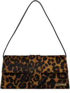 Hair-on leather and buffed leather shoulder bag in brown. · Graphic pattern printed throughout · Detachable buffed leather shoulder strap · Logo hardware at face · Card slot at back face · Magnetic flap · Card slot at interior · Cotton twill lining · Gold-tone hardware · H5 x W11 x D2.25 Supplier color: Leopard brown Leopard Print Bag, Leopard Bag, Fancy Bags, Pretty Bags, Cute Bags, Printed Bags, Dream Clothes, Fashion Killa, Cheetah Print