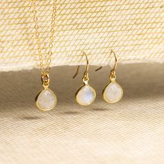 "Moonstone Necklace and Drop Earrings Matching Set - Delicate, Dainty, minimalist, simple gold jewelry gift for wife, girlfriend, daughter This listing is for a SET and includes both a pair of earrings and necklace. Gemstones: Rainbow Moonstone Bezel: Vermeil Gold (14k Gold over Sterling Silver) Note that due to the handmade nature of these genuine stones, measurements/color are approximately and might vary slightly for each stone. Necklace: Drop Gemstone: 11mm x 9mm Gold chain: 14k gold filled Delicate Moonstone Gold Jewelry, Delicate Gold Moonstone Jewelry, Gold Minimalist Moonstone Jewelry, Minimalist 14k Gold Filled Teardrop Jewelry, Dainty Gold Moonstone Jewelry, Simple Drop Earrings Jewelry As A Gift, Simple Drop Earrings As A Gift, Simple Design Drop Earrings As A Gift, Simple Design Drop Earrings Jewelry For Gifts