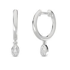 The Mini-Dewdrop Encompassing Drop Hoops are delicately crafted in solid gold with ethically sourced brilliant pear diamond. You can pair these with your favorite mini studs or huggie hoops. The dewdrop design adds an element of sophistication to these hoops, making them a stylish addition to your jewelry collection. Timeless Pear-shaped Diamond Earrings In White Gold, Timeless Sterling Silver Pear-shaped Diamond Earrings, Timeless Teardrop Brilliant Cut Diamond Earrings, Timeless Brilliant Cut Teardrop Diamond Earrings, Teardrop Fine Jewelry Diamond Earrings With Single Diamond, Teardrop Single Diamond Earrings In Fine Jewelry Style, White Gold Teardrop Diamond Earrings With Single Cut Diamonds, Timeless Teardrop Diamond Earrings For Anniversary, Minimalist Teardrop Diamond Earrings For Anniversary