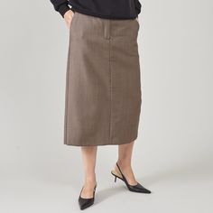 "Elevate your wardrobe with our Chic Beige Wool & Mohair Blend Straight Skirt - the epitome of modern elegance. Carefully crafted from a luxurious blend of wool and mohair, sourced from Italy, this skirt is a timeless addition to your fashion arsenal. With a convenient front zipper, a sophisticated back slit, and practical side pockets, it's as functional as it is stylish. Fully lined with viscose, it ensures comfort and ease throughout your day. Key Features: Material: Made from a premium blend of wool and mohair, this skirt embodies Italian luxury and craftsmanship. Main fabric: 73% wool, 27% mohair Lining: 100% viscose Design: The straight silhouette exudes chic modernity, while the front zipper, back slit, and side pockets are both stylish and practical. The silky viscose lining guaran Elegant Office Outfit, Elegant Office Wear, Wool Midi Skirt, Skirt For Women, Womens Pencil Skirts, Midi Skirt Pencil, Straight Skirt, Wool Skirts, Italian Fabric