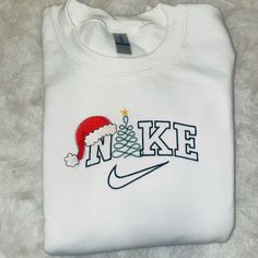 Christmas White Embroidered Tops, Winter White Embroidered Tops, White Embroidered Winter Tops, White Tops With Embroidered Logo For Christmas, White Tops With Custom Embroidery For Christmas, White Top With Embroidered Logo For Christmas, Holiday Cotton Top With Embroidery, Holiday Cotton Embroidered Tops, White Christmas Tops With Embroidered Graphics