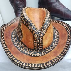 This Hat Is Amazingly Beautiful With Great Craftsmanship Displayed All Around. Handmade In Mexico. Beautifully Decorated Leather Handcrafted Stitching Vintage Antiqued Oiled Leather Pictures Do Not Do It Any Justice. Worn Twice Only Unisex Size 10 Brim 3.5" Crown 4" Excellent Pre-Owned Condition Unique And Truly A Beaut Of A Hat. $ 189 Firm Keywords Cowboy Cowgirl Western Rodeo Boho Hippie Chic Nashville Style Handbag Boots Musician 70's Retro Bohemian Woodstock Flower Leather Saddle Country Fab Artisan Brown Fedora Hat, Artisan Brown Hat With Short Brim, Artisan Brown Hats With Curved Brim, Brown Artisan Hat With Short Brim, Vintage Brown Handmade Hat Bands, Vintage Handmade Brown Hat Bands, Artisan Handmade Leather Hat, Handmade Artisan Leather Hat, Handmade Brown Country Hat Bands