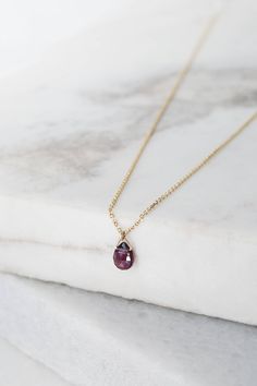 "\"A simple but elegant garnet pendant! January's birthstone has a deep red color. It is believed that those who wear it will have good health, peace, and wealth. It is also a symbol of good friendship. An exquisite and thoughtful gift! Easy to wear all day long or on a special occasion for a chic and sophisticated look! Is it for you? Even better! Everyone deserves a little treat once in a while!\" --Fairy Goldcharm Check out some layering options! https://www.etsy.com/listing/513878526/diamond Garnet Birthstone Necklaces In Fine Jewelry Style, Garnet Birthstone Necklace In Fine Jewelry Style, Garnet Birthstone Fine Jewelry Necklace, Dainty Ruby Gemstone Birthstone Necklace, Classic Garnet Birthstone Necklace, 14k Gold Briolette Gemstone Birthstone Necklace, 14k Gold Briolette Birthstone Necklace With Gemstone, Gold Chain Pendant, Paw Print Bracelet