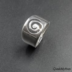 Wide Band Sterling Silver Spiral Ring, Unisex Infinity Symbol Statement Ring, Handmade Greek Jewelry, Men's Jewelry Inspired by the ancient Greek spiral infinity symbol. A meaningful statement gift that is supposed to provide good luck and long life upon the wearer. 925 Sterling silver ring bandwidth degrading from 13 to 6 mm wide Hallmarked 925 onto the inside of the ring This is more of my Greek Jewelry collection http://www.etsy.com/shop/GreekMythos?section_id=8103459 and Here you may find mo Goddess Jewelry, Spiral Ring, Art Necklaces, Greek Jewelry, Art Pendant, Infinity Symbol, Geometric Necklace, Wide Band Rings, Material Girl