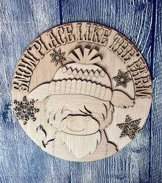 a wooden plaque with an image of a man wearing a hat