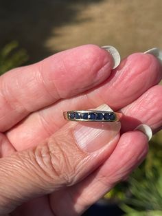 Natural Sapphire channel set band Ring. Ring is 3.5 mm~ sits 2.9 mm off your finger. The size is 10 (VERY easy SIZE), There are 7---4 point /sapphires for a total of 28 points. There are a few light abrasions on a few of the stones.   This is a one of a kind ring!! None of your friends will have this kind of ring!! Please checkout more of my items:)  https://www.etsy.com/shop/gems4borth?ref=search_shop_redirect You can no longer put in a detailed return policy in Etsy.   So, here is mine:  3 day Sapphire Wedding Band Stack, Stacker Rings, Round Sapphire, Channel Set, Blue Band, Natural Sapphire, Gold Wedding Band, Gorgeous Jewelry, Stackable Rings