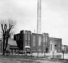 black and white photograph of an old factory