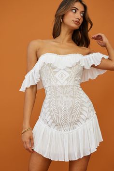 Stop whatever you are doing and take a moment to behold the beauty that is our Dreamy dress. Aptly named because, well, it's just downright DREAMY. The slight sweetheart neckline, the drapey off-shoulder, crêpe ruffle sleeves, the flirty ruffle hemline, this dress has it all! And how stunning is that embroidery throughout the torso? Heaven! Pair it with simple nude heels because this dress is already perfection. Fitted Off-shoulder Midi Dress For Brunch, Flirty White Off Shoulder Dress For Date Night, White Flirty Off Shoulder Dress For Date Night, White Fitted Off-shoulder Evening Dress, Flirty White Off Shoulder Dress For Summer, White Strapless Off Shoulder Flirty Dress, Flirty White Dress With Straight Neckline, Off-shoulder Dress With Fitted Bodice For Brunch, Flirty Off-shoulder Strapless Dress For Brunch