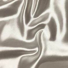 a close up view of a shiny silver fabric