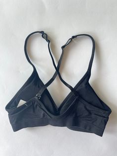 A-B cup V bra. Our convertible V Bras come in 2 cup sizes A/B & C/D The back straps can be criss crossed to accommodate racerback tops Strappy Stretch Bra With Built-in Support, Workout Bra With Cross Back Straps, Workout Cross Back Bra, Medium Support Sports Bra With Strappy Back, Medium Support Sports Bra With Adjustable Cross Back Straps, Sports Bra With Adjustable Straps And Cross Back, Everyday Fitted Bra With Padded Cups, Seamless Sports Bra With Cross Back, Crisscross Sports Bra With Adjustable Straps For Workout