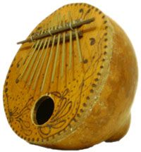 a close up of an old wooden instrument