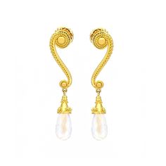 Classic Collection — Earrings set with Moonstone briolettes in granulated 22k yellow gold and 18k yellow gold posts. TABS Details Metal Purity: 22k and 18k yellow gold Gemstone Details: Moonstone Briolettes - 18 x 8mm; 14.20 carat total weight Measurements: 51.52 mm long x 10.15 mm wide /TABS Elegant 22k Gold Gemstone Earrings, Classic Collection, Ear Wire, Alchemy, Earrings Set, Earring Set, Moonstone, 18k Gold, Yellow Gold