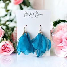 Make a statement with these eye-catching teal flower material dangle earrings! Featuring a unique and stylish gold studs hooks, they'll bring some sass to any outfit! Show off your unique style today! Size: 8cm * Free Domestic Shipping On All Orders Over $60 * Worldwide Shipping Elegant Summer Flower Earrings With Ear Wire, Flower Earrings For Summer Parties, Spring Party Jewelry In Turquoise, Spring Party Turquoise Jewelry, Elegant Turquoise Earrings For Summer, Turquoise Dangle Earrings For Spring, Spring Turquoise Flower Earrings, Blue Flower Earrings With Ear Wire For Party, Turquoise Earrings For Spring Party