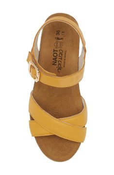 A gleaming buckle stands out against the supple leather straps on this open-toe sandal set on a low wedge for comfortable height. 1 3/4" heel (size 39) Adjustable ankle strap with buckle closure Cushioned footbed with arch support Leather upper and lining/synthetic sole Gold Leather Sandals With Leather Footbed, Gold Leather Footbed Sandals With Buckle Closure, Gold Leather Sandals With Tang Buckle, Gold Open Toe Footbed Sandals With Cushioned Sole, Gold Open Toe Footbed Sandals With Cushioned Footbed, Gold Open Toe Wedge Sandals With Buckle Closure, Gold Wedge Sandals With Buckle Closure And Open Toe, Gold Open Toe Footbed Sandals With Cork-bed Midsoles, Gold Footbed Sandals With Removable Insole