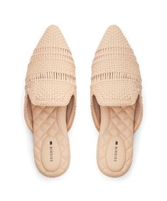 Our Dove mule is handcrafted of airy faux leather and includes a striking pointed-toe silhouette. The elevated shoe is handwoven with a latticework geometric design that molds to your foot for a perfect fit. A transparent mesh lining makes these shoes breathable for warm weather. We covered our footbeds with a soft leather lining for added durability and comfort. | The Dove - Dawn Woven Birdies Slides Beige Pointed Toe Mules For Summer, Summer Beige Pointed Toe Mules, Chic Spring Mules With Woven Leather, Chic Woven Leather Mules For Spring, Beige Closed Toe Pointed Flats For Summer, Spring Mules With Branded Insole And Pointed Toe, Beige Pointed Toe Mules For Spring, Chic Flat Heel Woven Leather Mules, Chic Woven Leather Flat Heel Mules