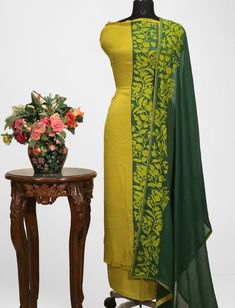 A stunningly fabulous outfit, featuring Kashmiri Tilla Embroidery. - - - - - - - - - - - - - - - - - - - - Product Details- Condition: Brand New- Style: Indian Ethnic Suit- Colour: Lime & Bottle Green- Embroidery Color: Green- Care Instructions: Dry Clean OnlyF A B R I CShirt: ChinonDupatta: Viscose GeorgetteLower: Indian CrepeF I N I S HUnstitched/Semi-StitchedYou can get it stitched locally.47+ inches of Shirt Length and up to full sleeves length.StitchedWant something ready to wear? We ca Embroidered Pista Green Salwar Kameez In Mulmul, Embroidered Pista Green Mulmul Salwar Kameez, Designer Green Banarasi Silk Kurta, Embroidered Mulmul Palazzo Set In Pista Green, Pista Green Embroidered Salwar Kameez In Mulmul, Green Churidar With Chikankari Embroidery For Navratri, Embroidered Pista Green Mulmul Palazzo Set, Green Semi-stitched Silk Palazzo Set, Semi-stitched Silk Churidar In Pista Green